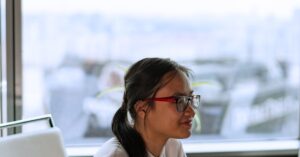 professional woman looking out window Hyderabad