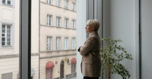 professional woman window view