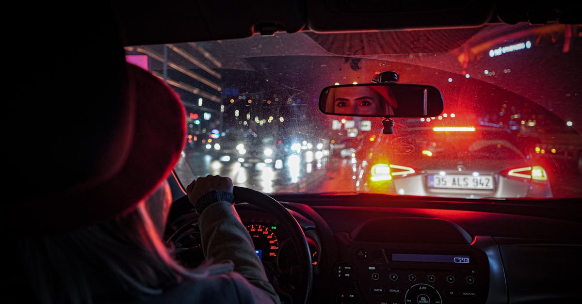 professional woman driving at night