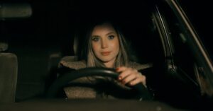 female entrepreneur driving at night