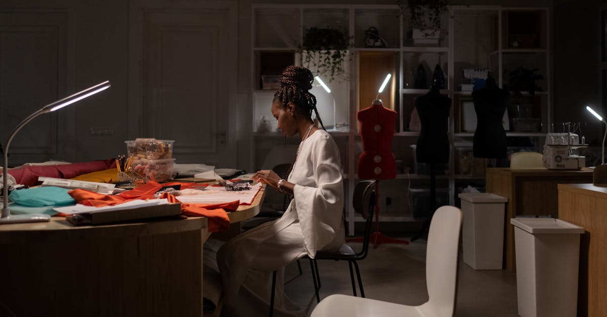 female fashion designer working late