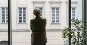 professional woman thinking window