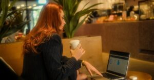 professional woman working late café