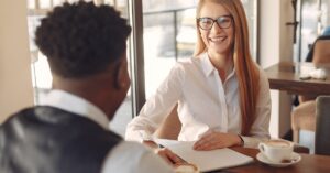 professional woman cafe meeting