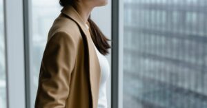 professional woman thinking at window Hyderabad