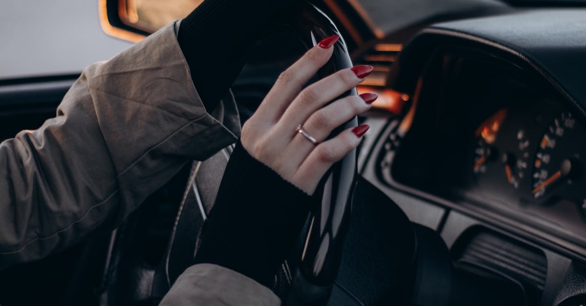 woman driving car evening