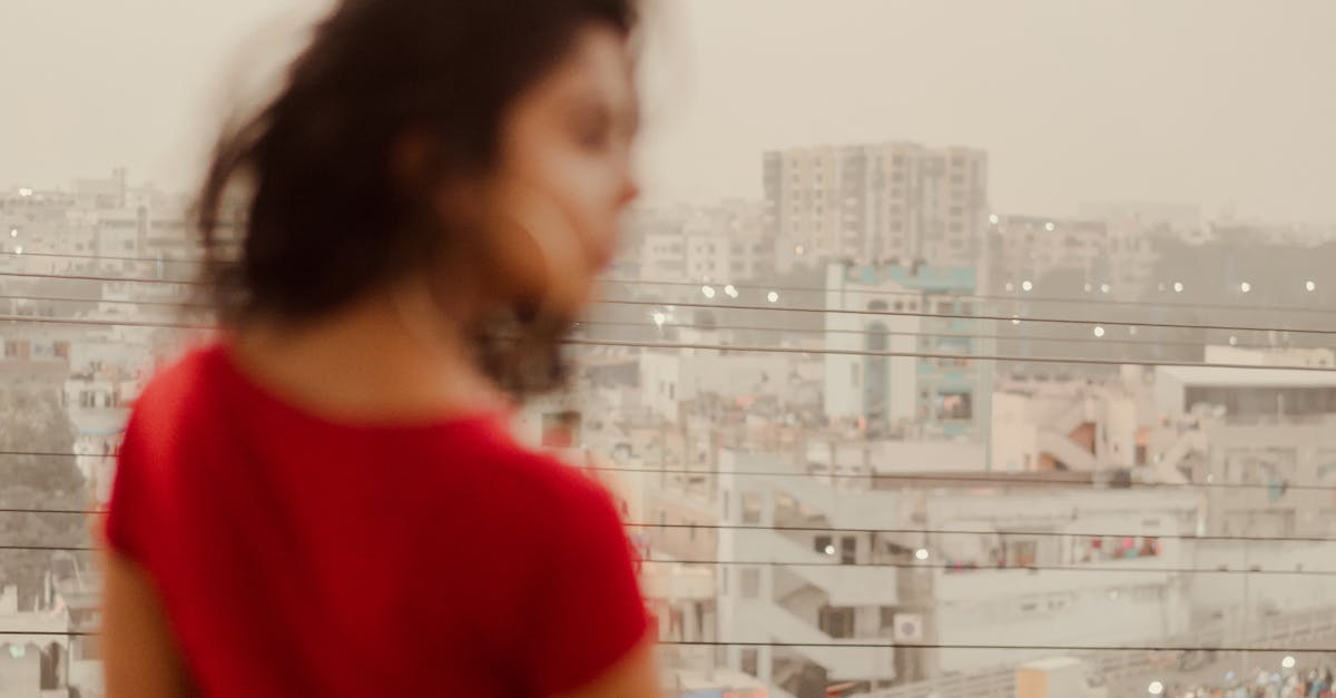 professional woman balcony hyderabad night