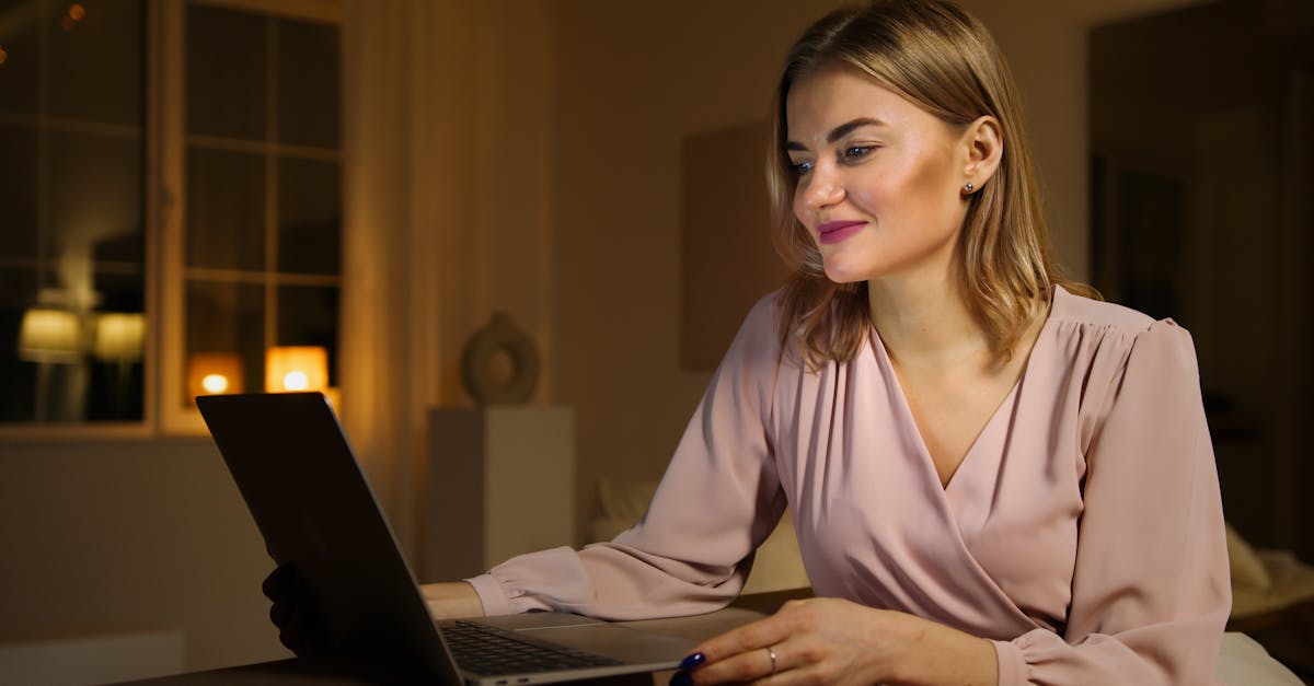 successful woman laptop night