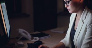 successful woman working late
