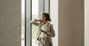professional woman looking out window