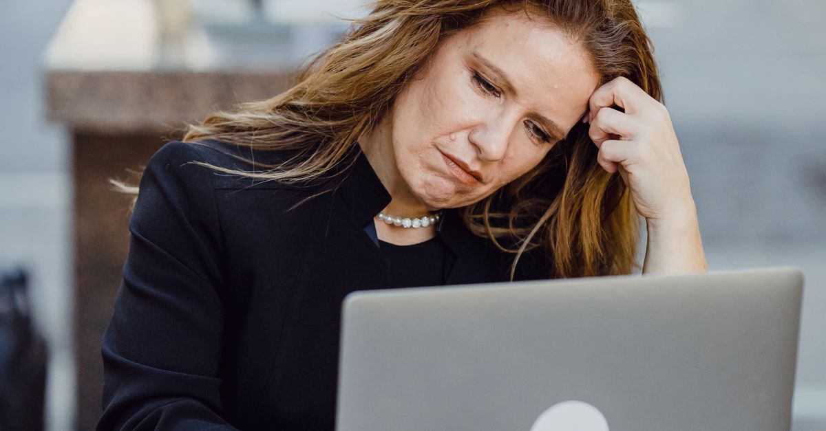 professional woman working stress laptop