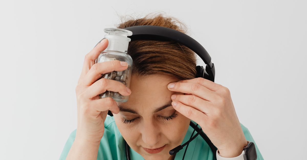 stressed doctor woman laptop