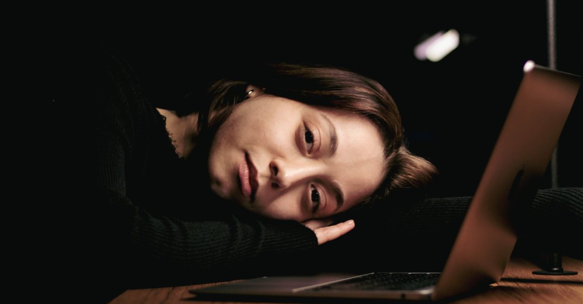 melancholy woman office night