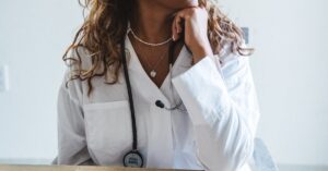 female doctor looking thoughtful in clinic
