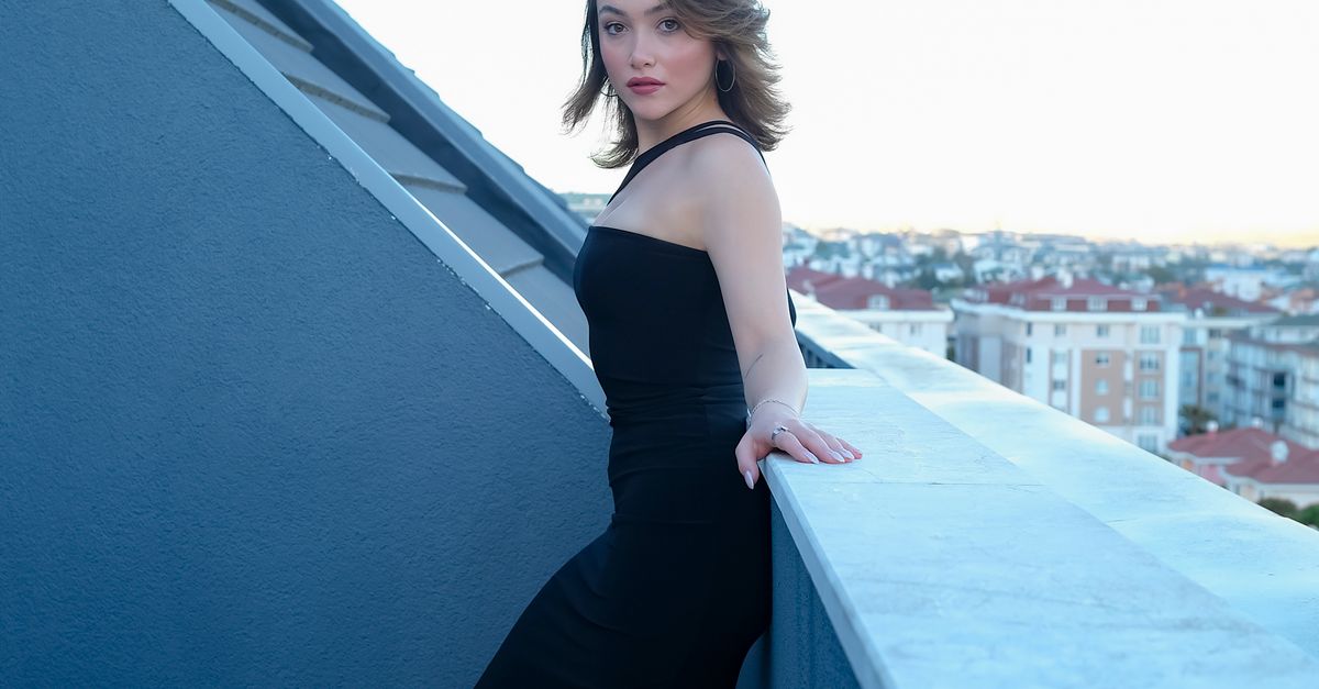 professional woman balcony evening