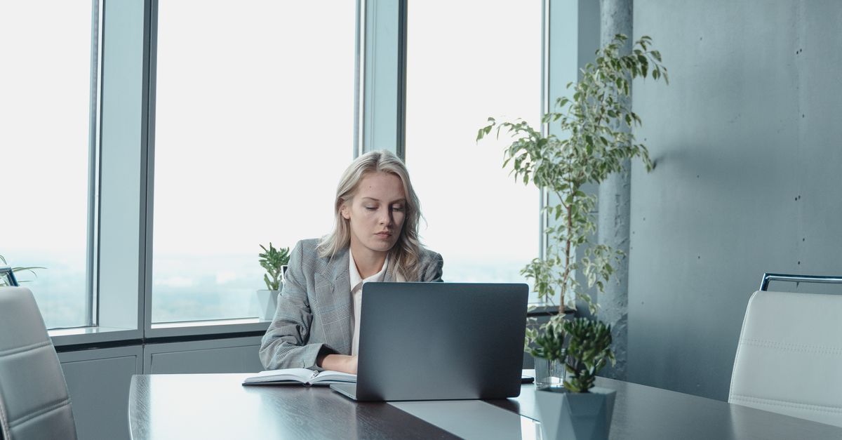 corporate woman work desk alone