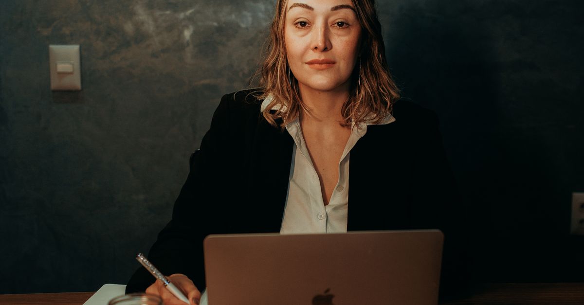 professional woman laptop evening