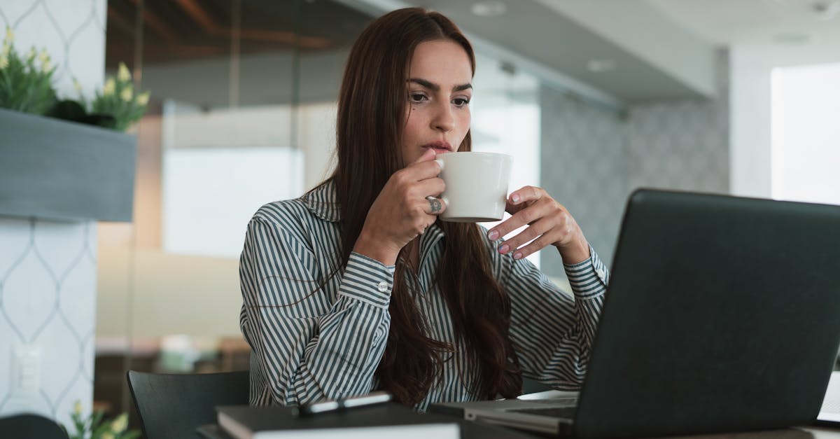 professional woman coffee laptop